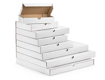 Pile de boîtes compactes de RAJA comme exemple de packagings cosmétiques